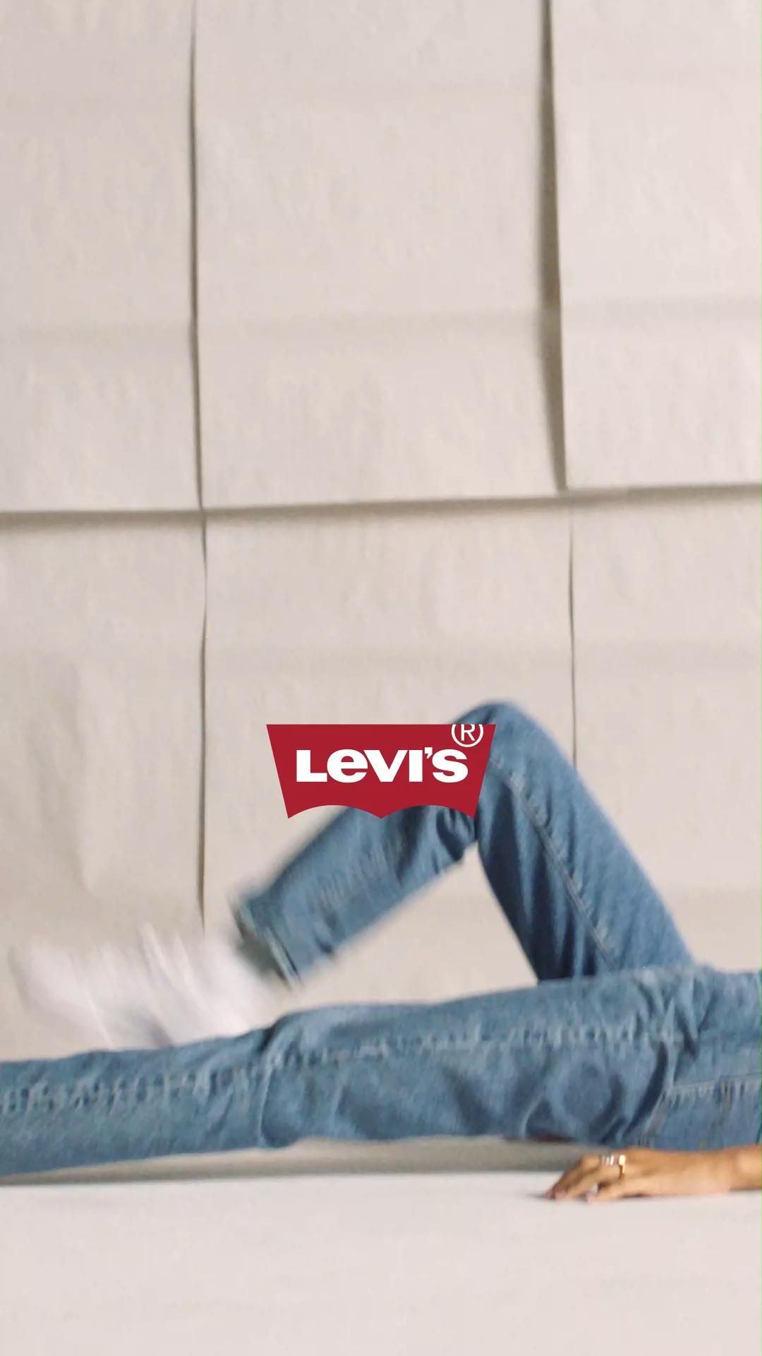Story: Surreal Levi's legs-through-sheets composition