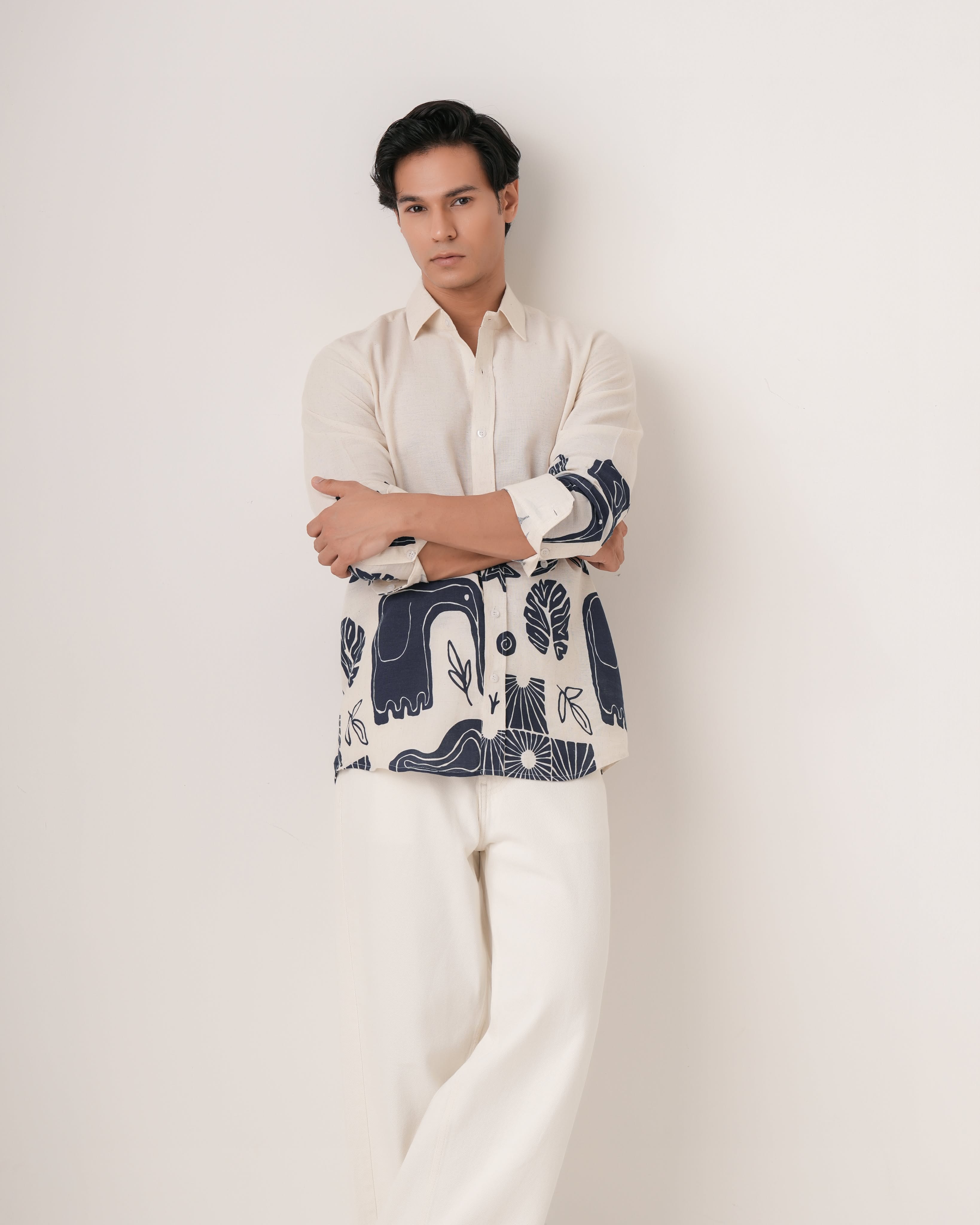 Carousel: Three folded printed shirts forming a winning tic-tac-toe line, slide 2