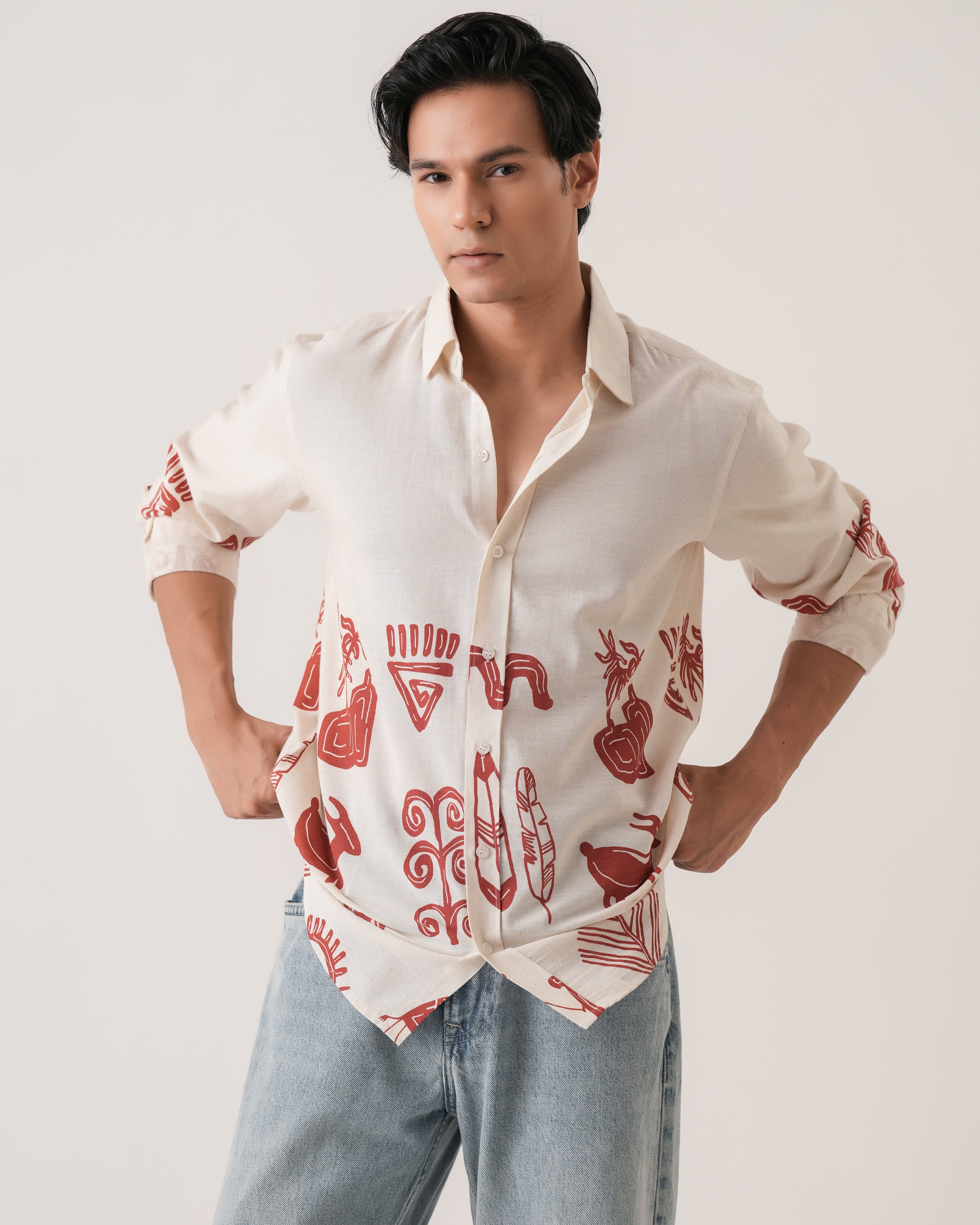 Carousel: Three folded printed shirts forming a winning tic-tac-toe line, slide 4