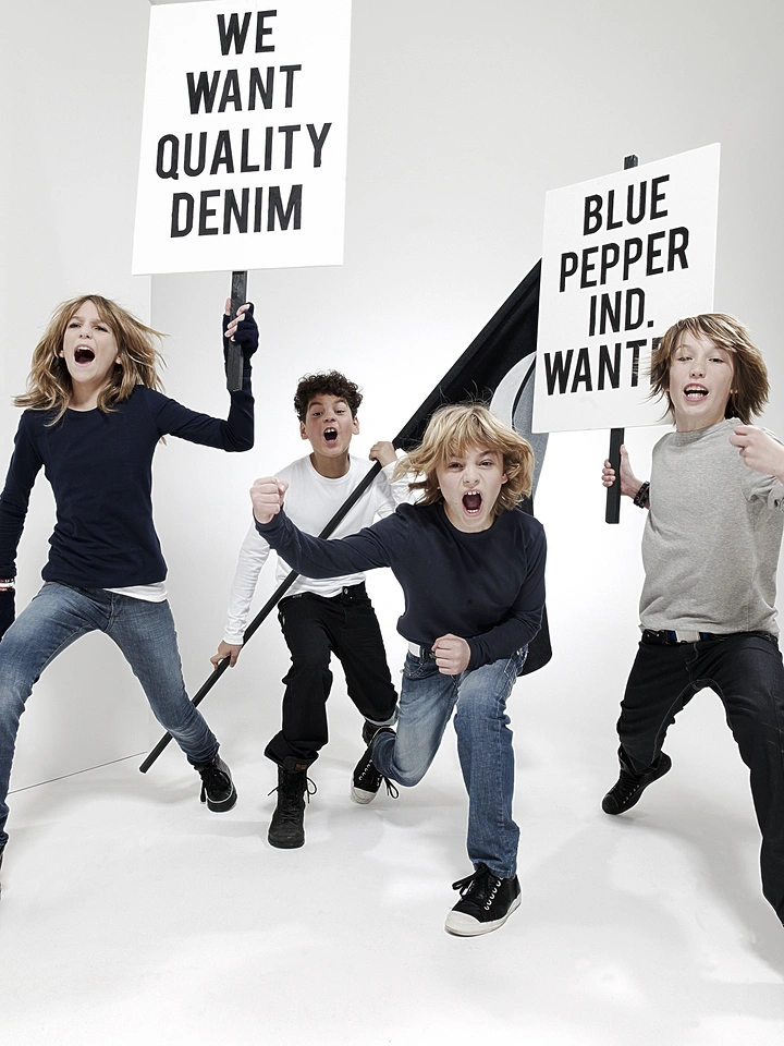 Kids Clothing creative ad: Kid protest: 'We want quality denim'