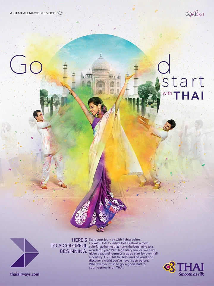 Holi creative ad: Woman in purple saree dancing amid Holi colour clouds before a Taj Mahal circle