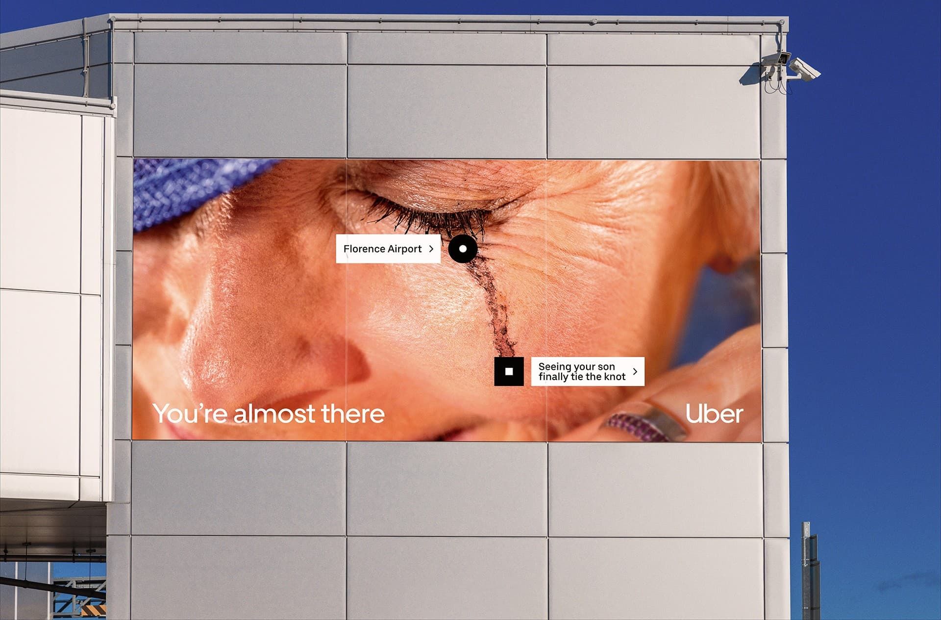 Banner: Uber billboard turns arrival into close-up tension