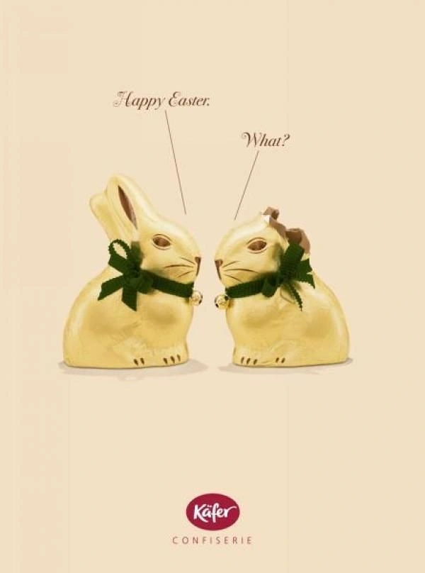 Easter creative ad: Two gold chocolate bunnies, one ear bitten