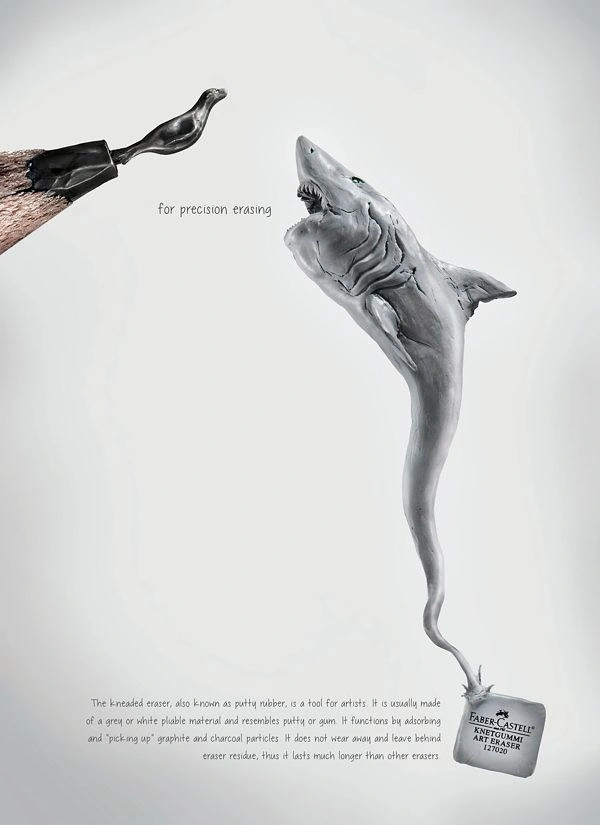 Stationery Shops creative ad: Kneaded eraser stretched into a shark hunting a graphite seal