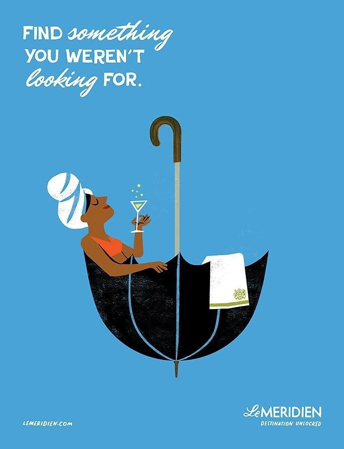 Creative ad: Woman bathing in an upturned umbrella sipping a martini