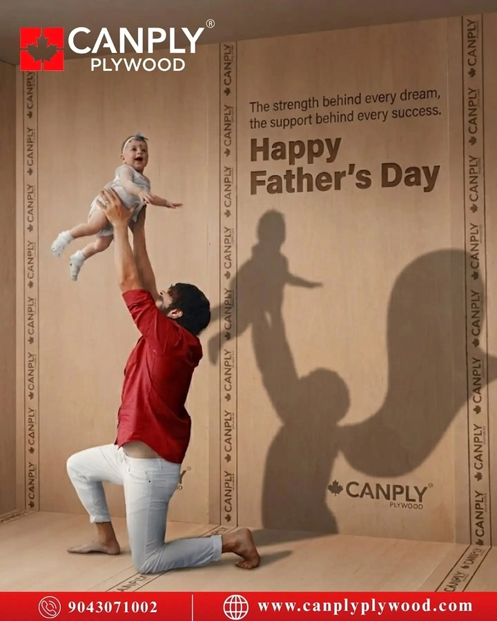 Father's Day creative ad: Kneeling father lifting a baby in a plywood box room, with their shadow on the wall