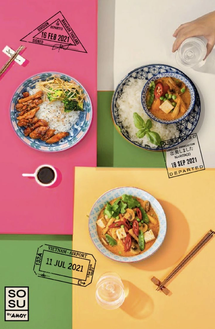Cloud Kitchens & Food Trucks creative ad: Passport stamps over colour-block food flatlay