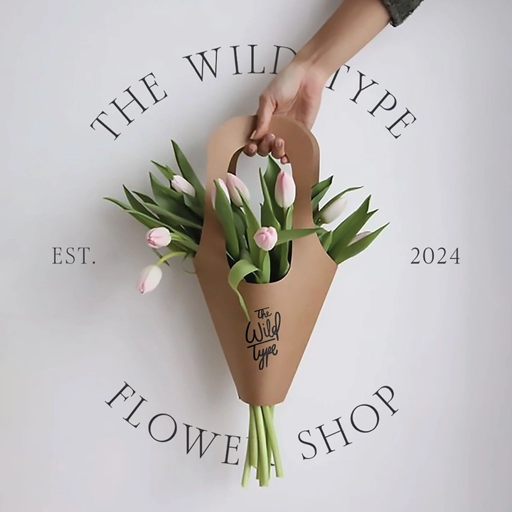 Florists creative ad: Bouquet bag becomes center of shop emblem