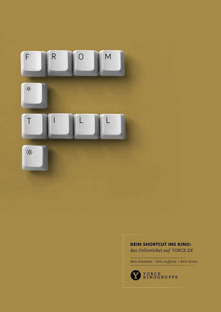 Cinemas & Movie Theatres creative ad: White keyboard keycaps spelling a message with brightness keys