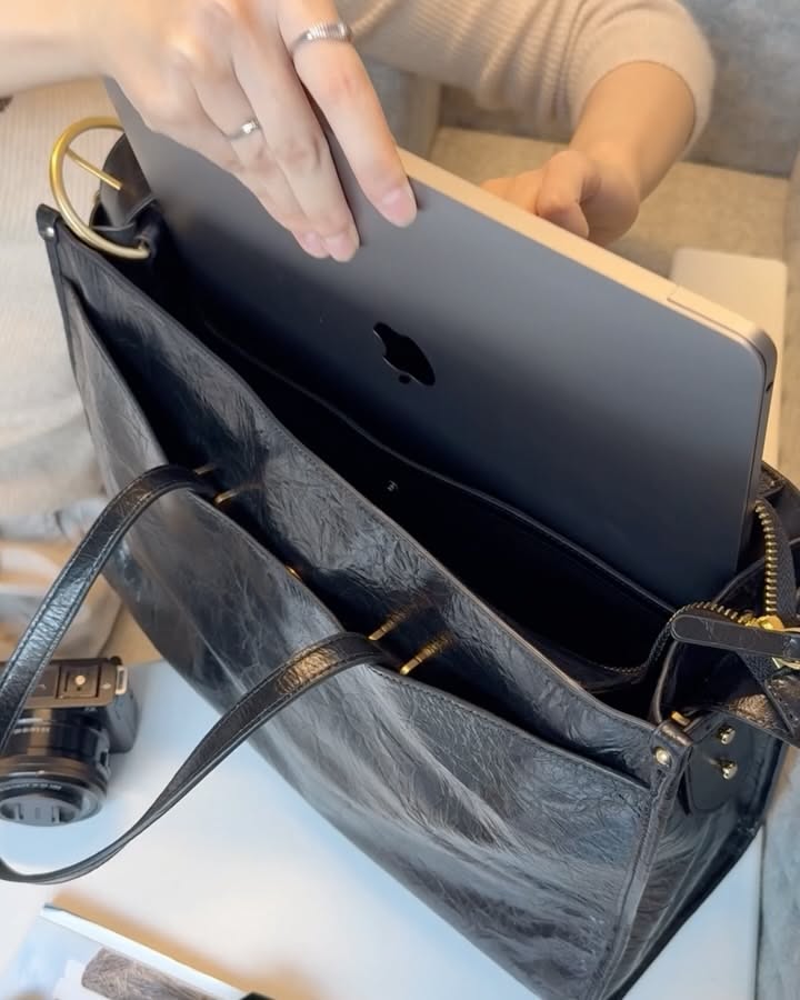Instagram post: Bag becomes labeled travel command center, slide 4