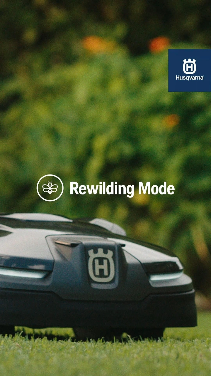 Landscaping & Gardening creative ad: Autonomous lawn mower in a lush garden