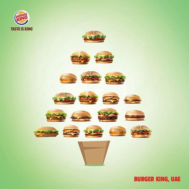 Christmas creative ad: Burgers stacked in rows to form a Christmas tree in a kraft pot