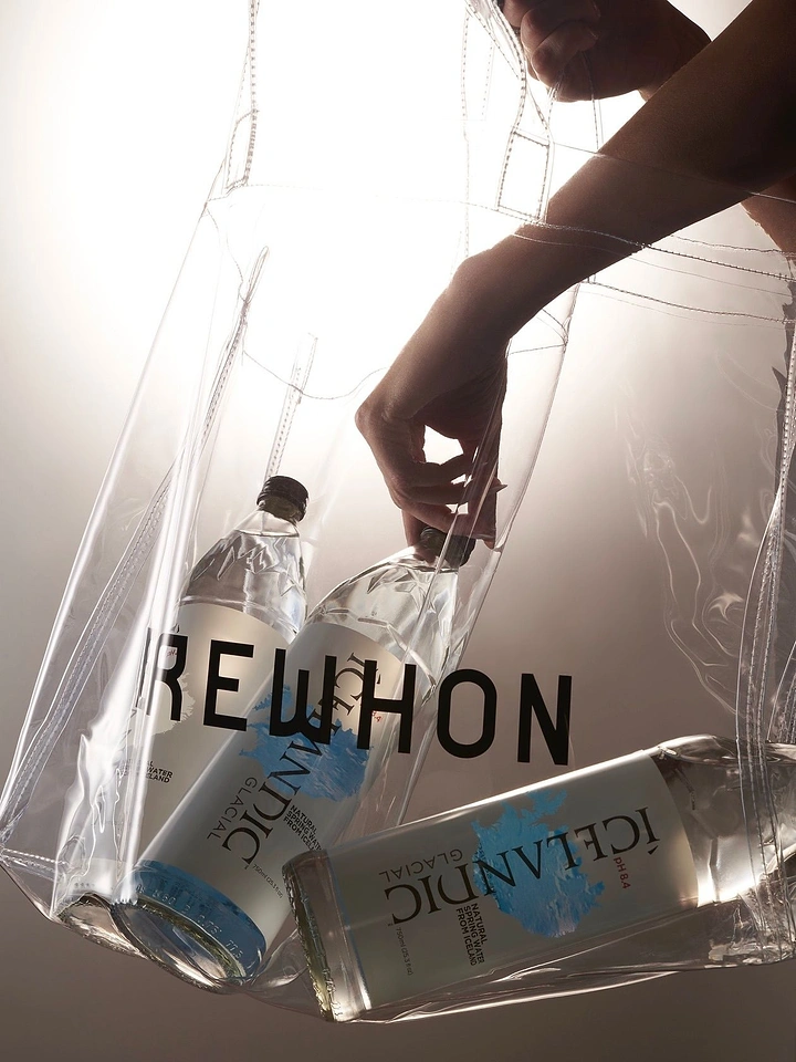 Packaged Drinking Water creative ad: Bottles staged inside transparent fashion bag
