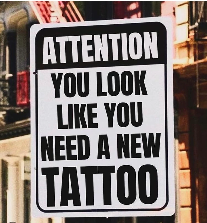 Tattoo Studios creative ad: Street warning-sign pun: need new tattoo
