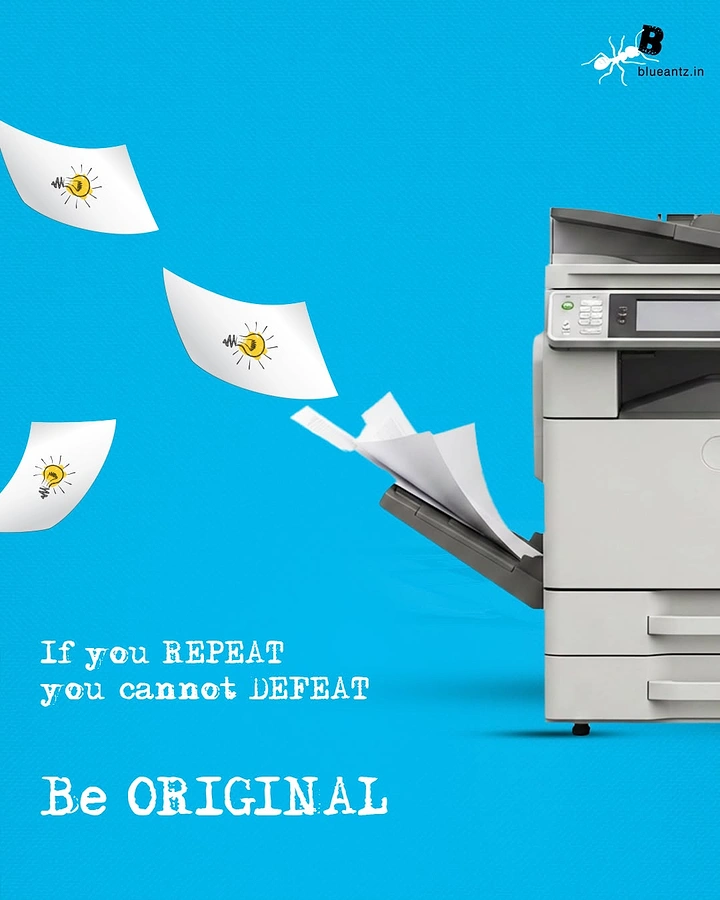 Printing Shops creative ad: Copier spitting idea-bulb papers, 'repeat/defeat' pun