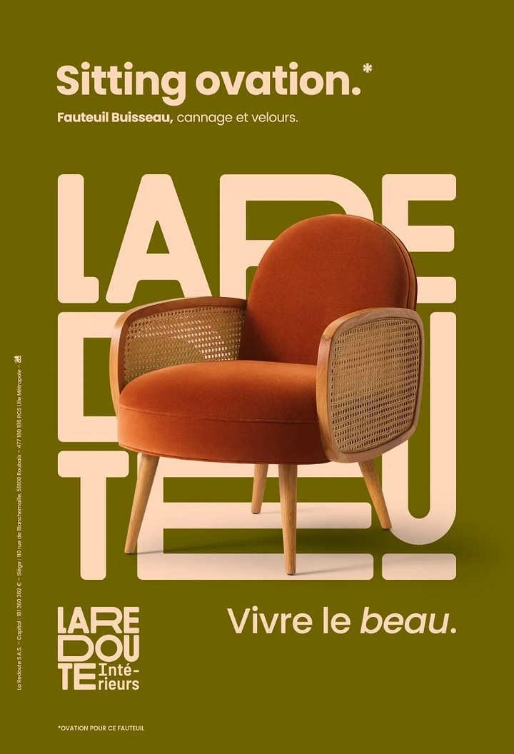Creative ad: Rust velvet armchair with cane sides in front of giant brand letters