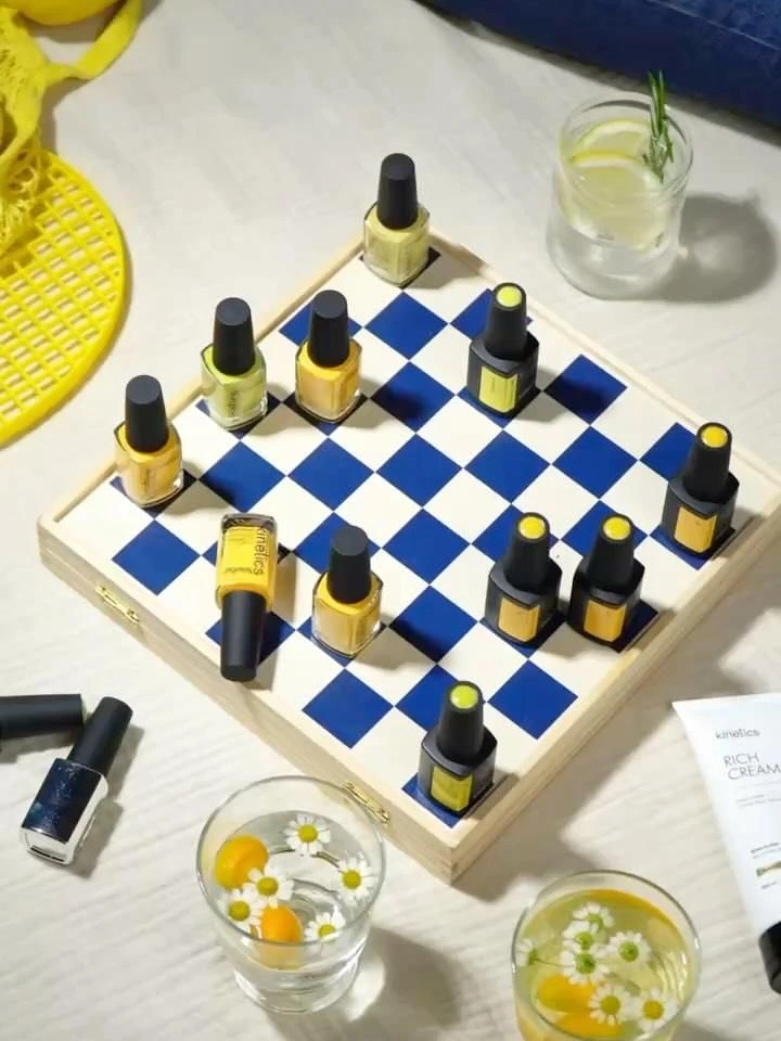Nail Polish Brands creative ad: Nail bottles transform a board game