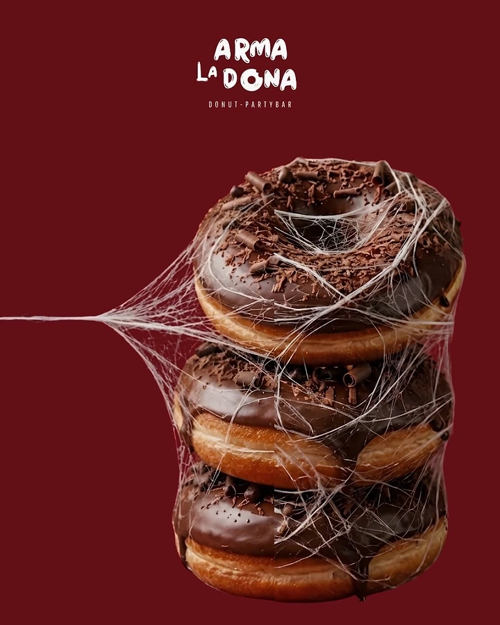 Donut Shops creative ad: Web-wrapped donut stack creates intrigue