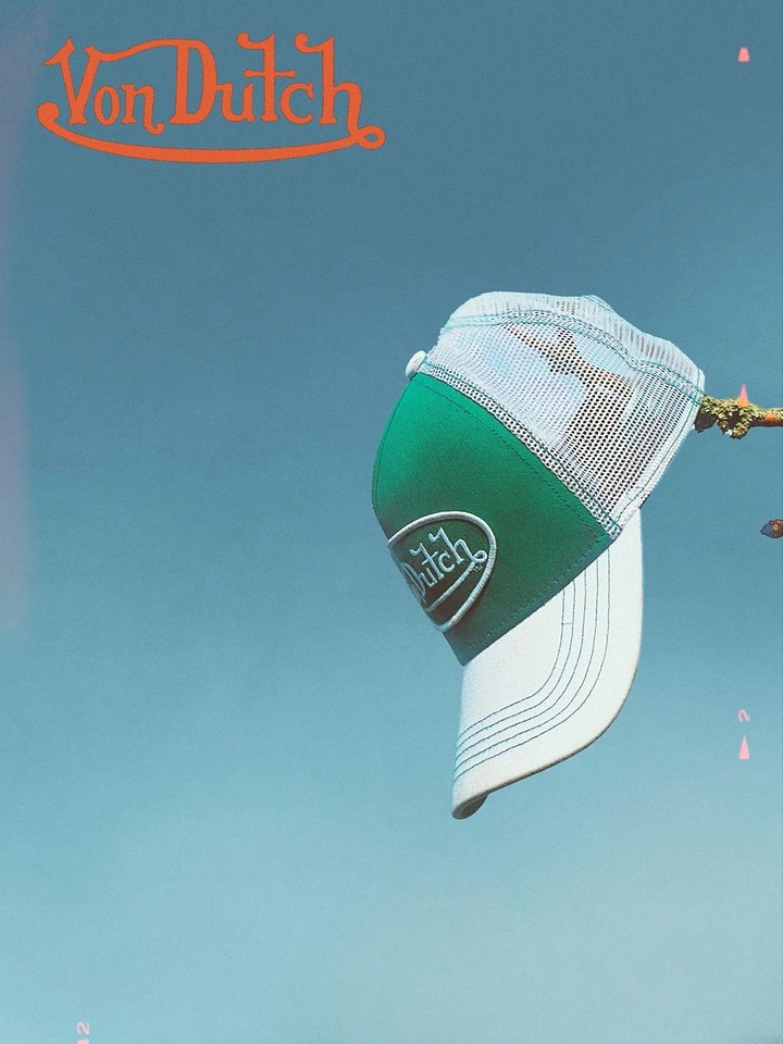 Hats & Caps creative ad: Floating cap creates surreal composition