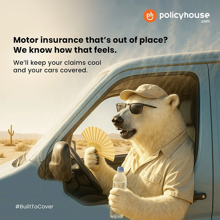 Insurance creative ad: Sweating polar bear in sunglasses driving a van through the desert