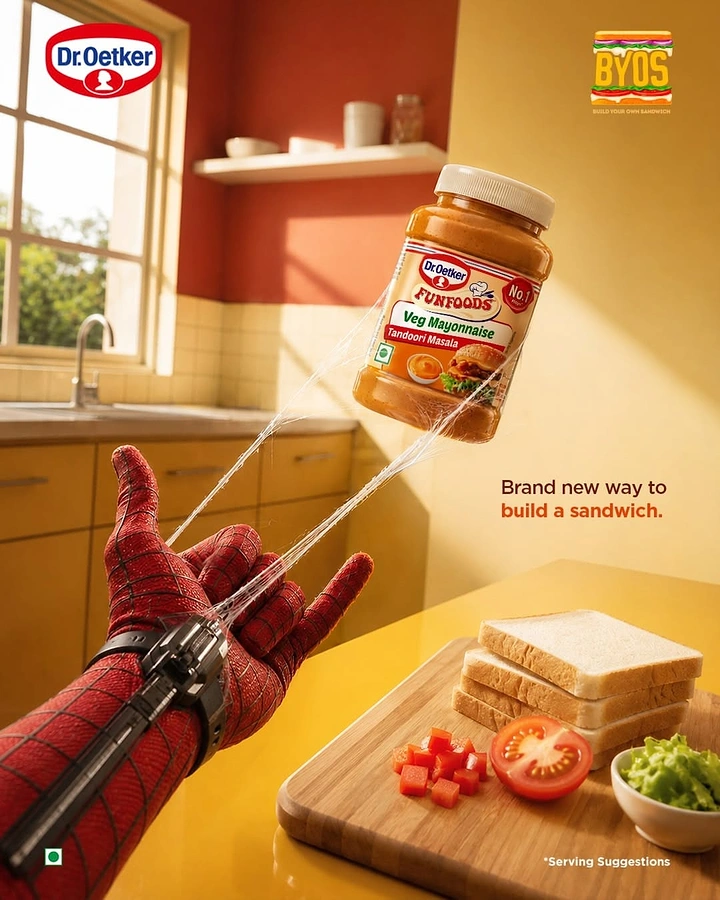 FMCG creative ad: Spider-suited hand web-slinging a mayonnaise jar in a sunlit kitchen