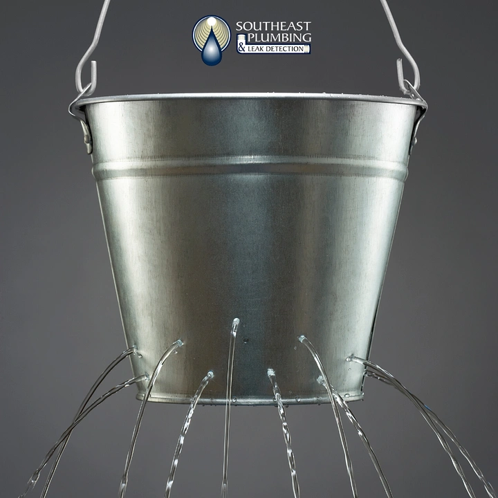 Plumbers creative ad: Leaking bucket as leak-detection metaphor