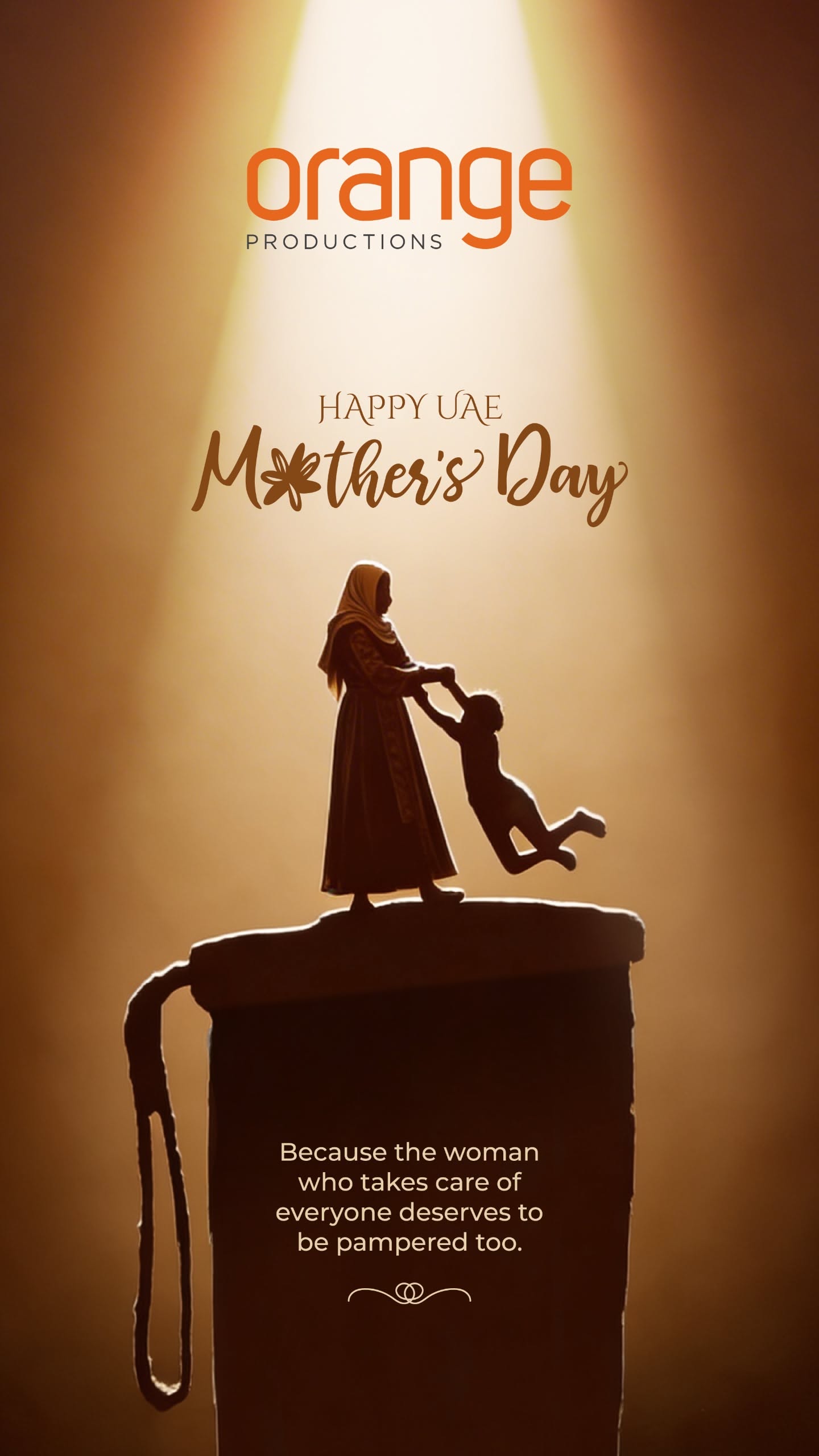 Silhouette of a mother in hijab swinging a child, standing on top of a large cylindrical object under a spotlight