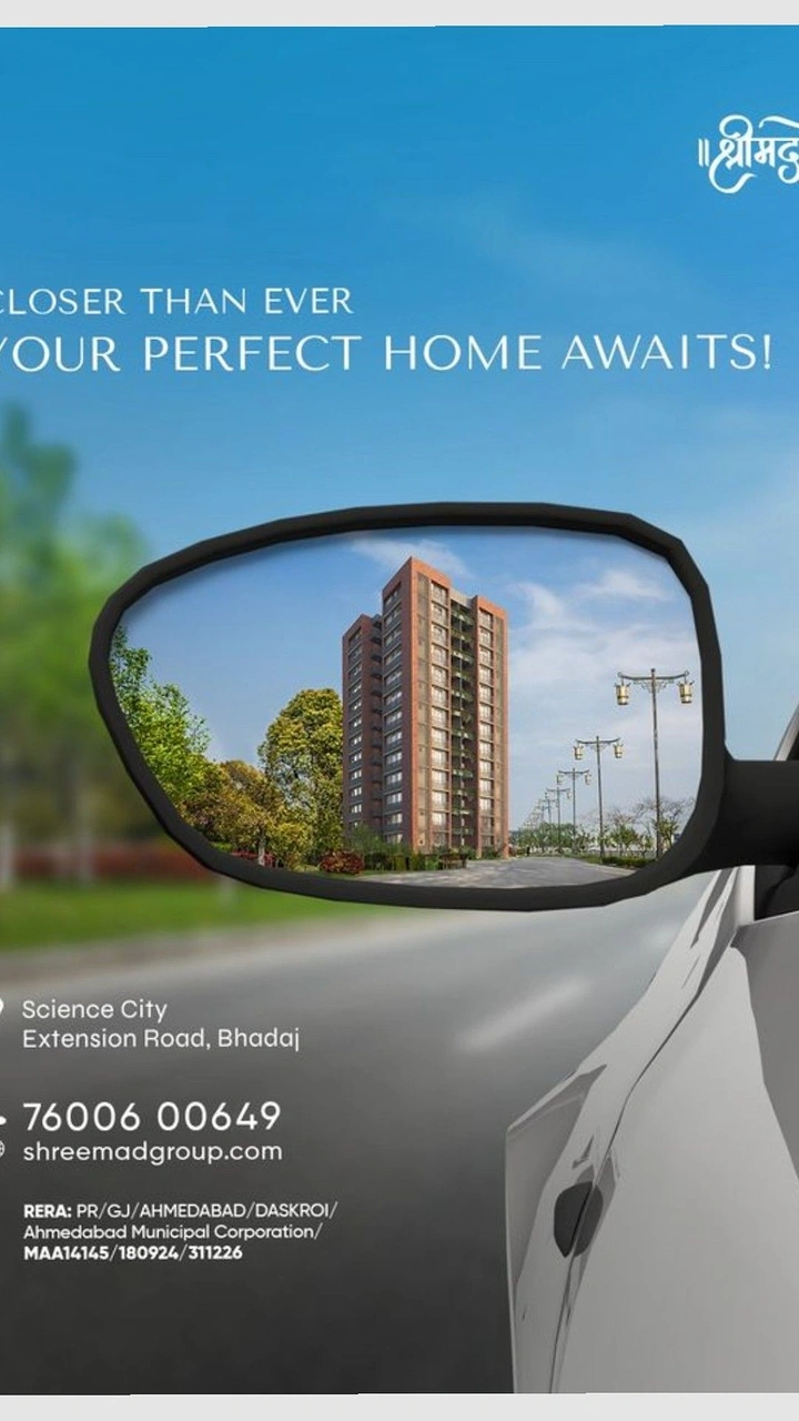 Real Estate Agents creative ad: Car mirror reflects tower: closer than ever