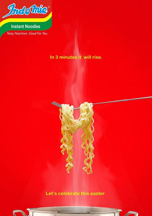 Easter creative ad: Noodles hanging from a fork shaped like a cross