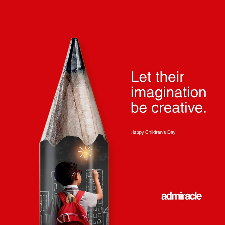 Children's Day creative ad: Giant sharpened pencil whose body shows a schoolboy chalk-drawing buildings