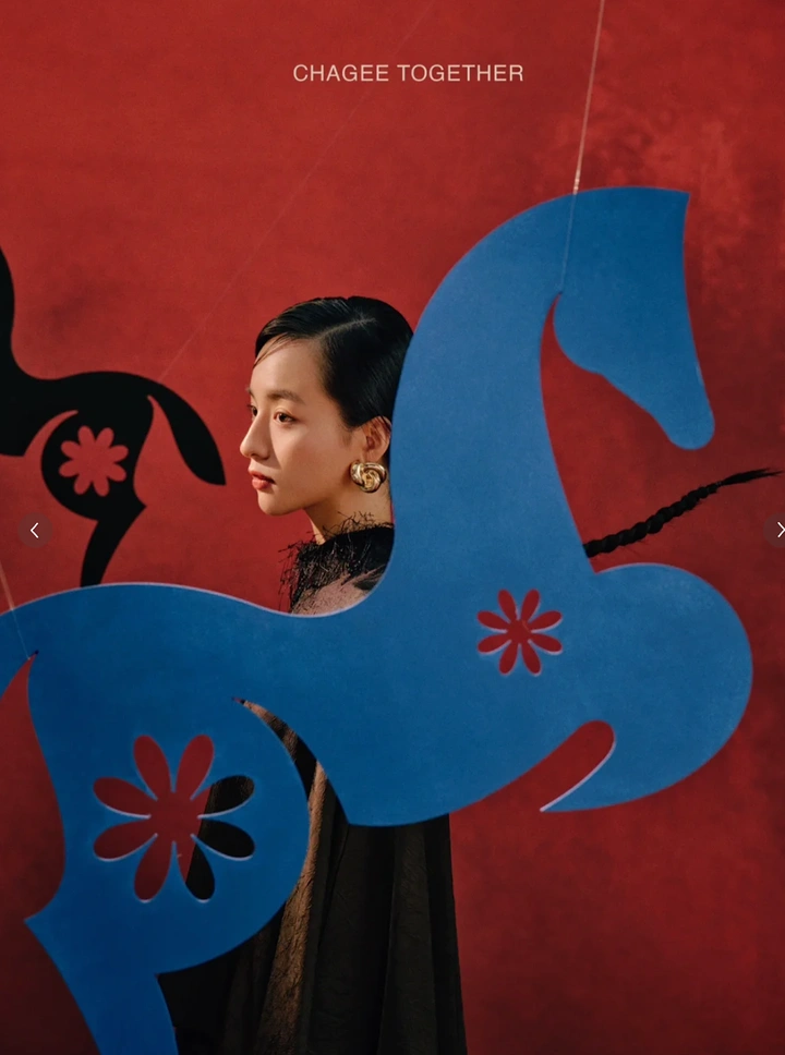 Lunar New Year creative ad: Woman in profile framed by hanging blue horse cutout