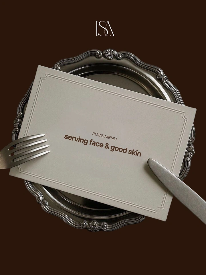 New Year creative ad: Menu card on ornate plate with cutlery