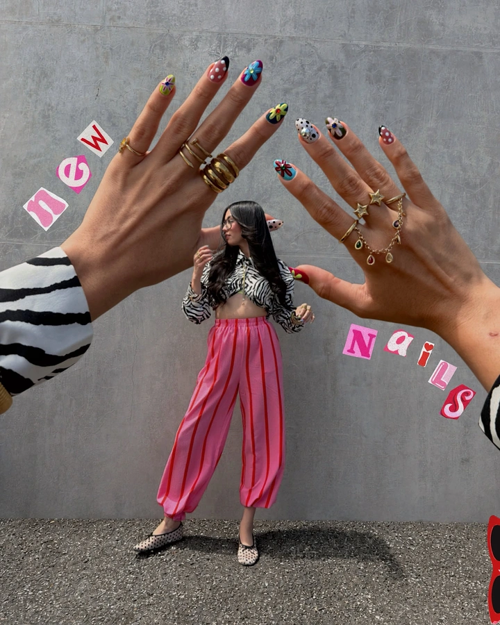 Nail Salons creative ad: Giant hands frame model, forced perspective
