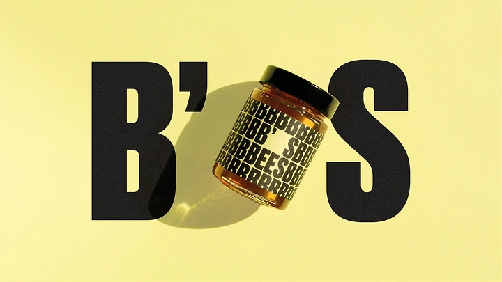 Honey Brands creative ad: Honey jar integrated into typography