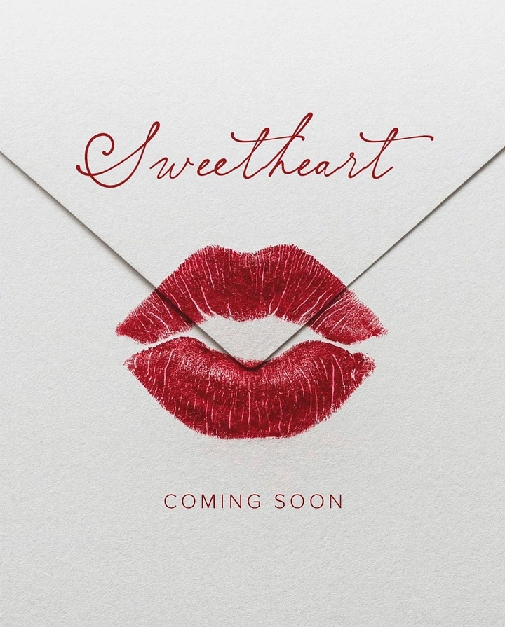 Valentine's Day creative ad: Red lipstick kiss print on a white envelope