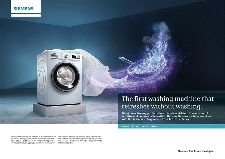 Home Appliances creative ad: A white washing machine releasing an illuminated stream of fabric and oxygen particles