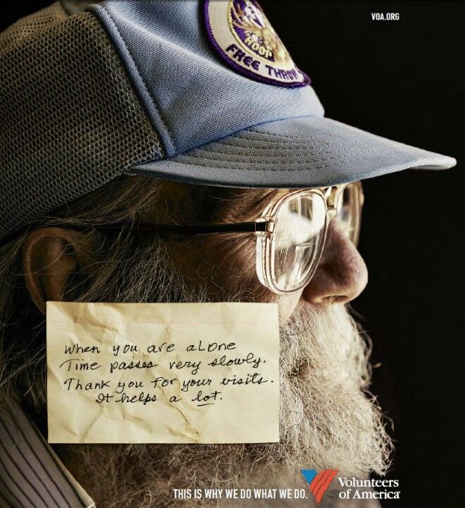 Poster: Close-up profile of a bearded elderly man with a handwritten note over his face
