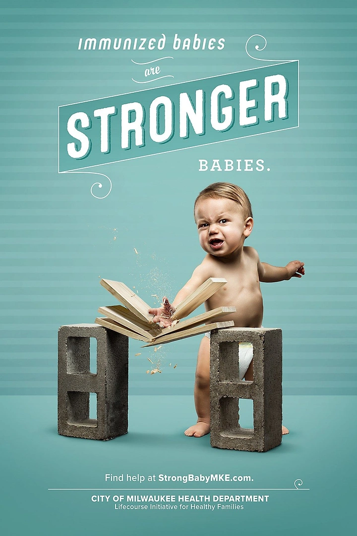 Healthcare creative ad: Diapered baby karate-chopping wooden boards on cinder blocks