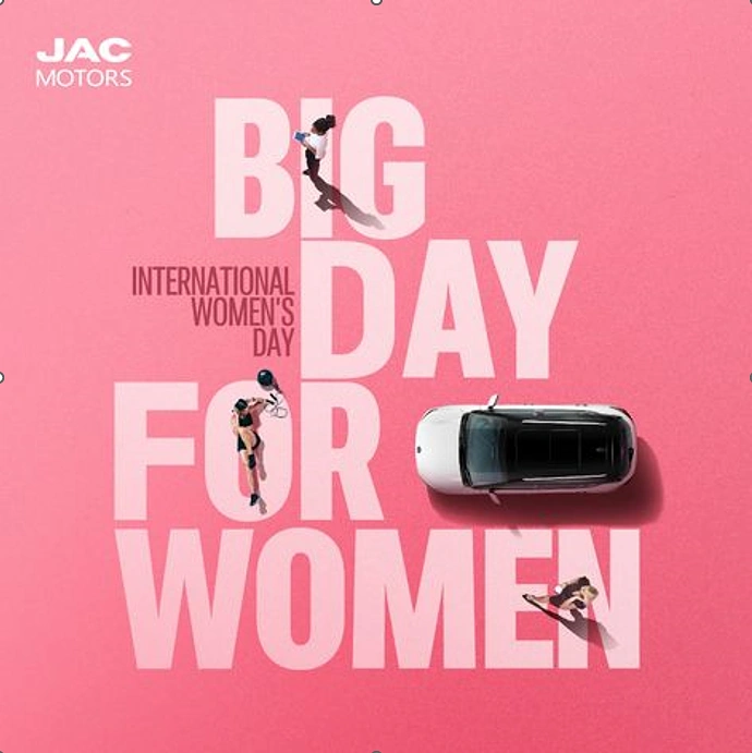 Women's Day creative ad: Top-down car and tiny women on giant letters