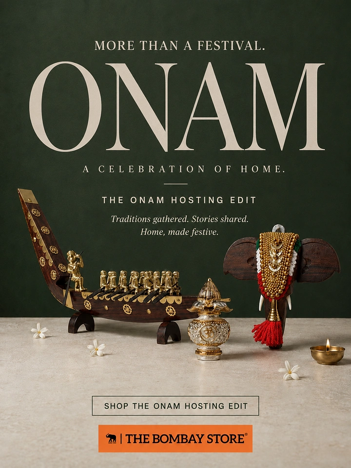 Onam creative ad: Still life of Kerala brass-and-wood decor on stone surface