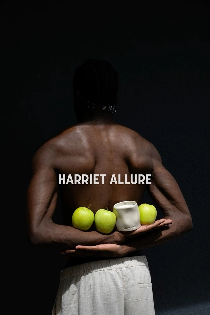Candles & Home Fragrance creative ad: Apples and candle behind bare back