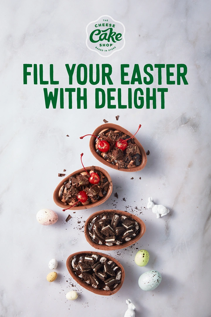 Easter creative ad: Top-down view of chocolate egg halves filled with dessert