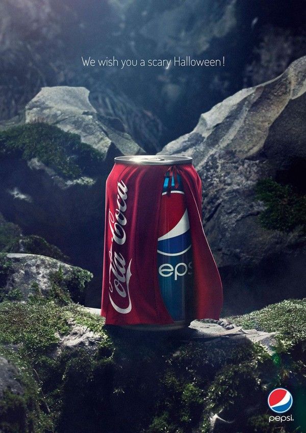 Soda can wearing a rival-brand cape as a Halloween costume