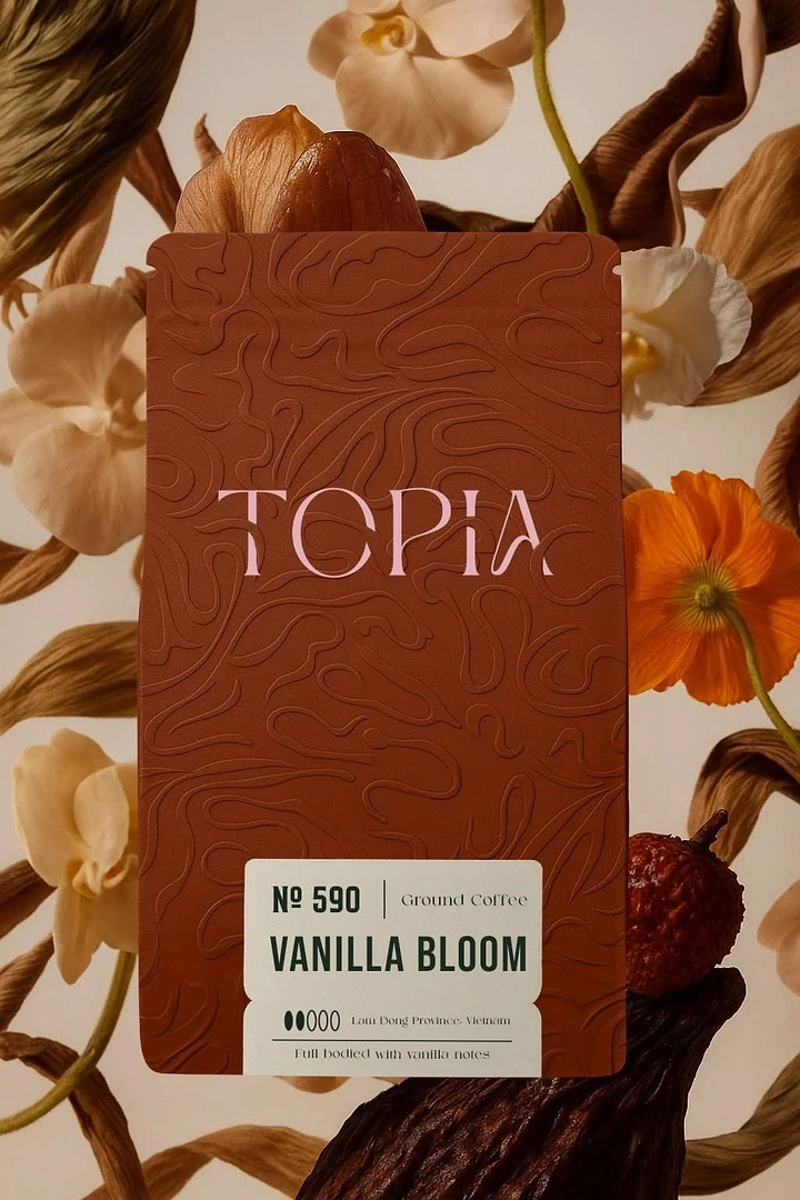 Coffee Shops creative ad: Terracotta coffee pouch framed by orchids and dried botanicals