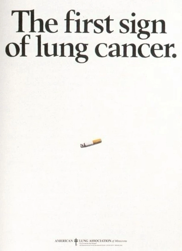 Nonprofit & Social Cause creative ad: Tiny stubbed-out cigarette butt on blank white page