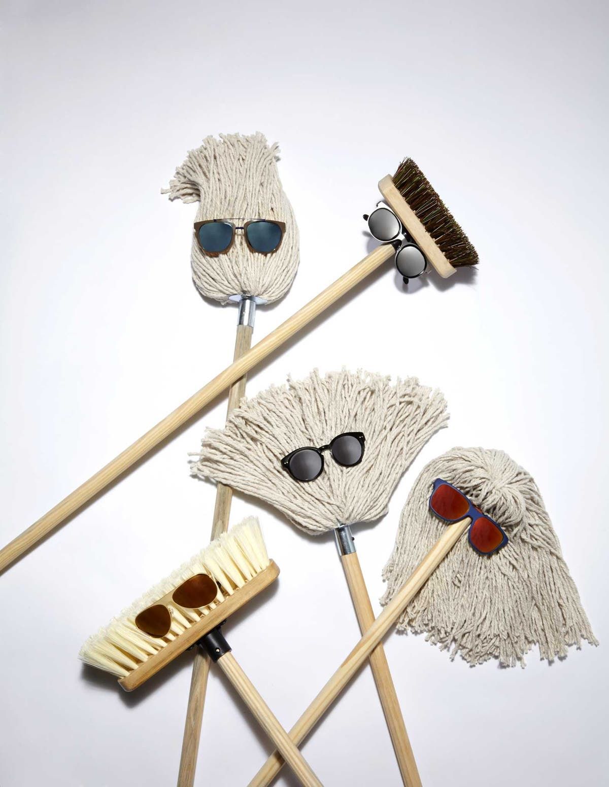 Instagram post: Mops and brooms wearing sunglasses like faces with hairdos