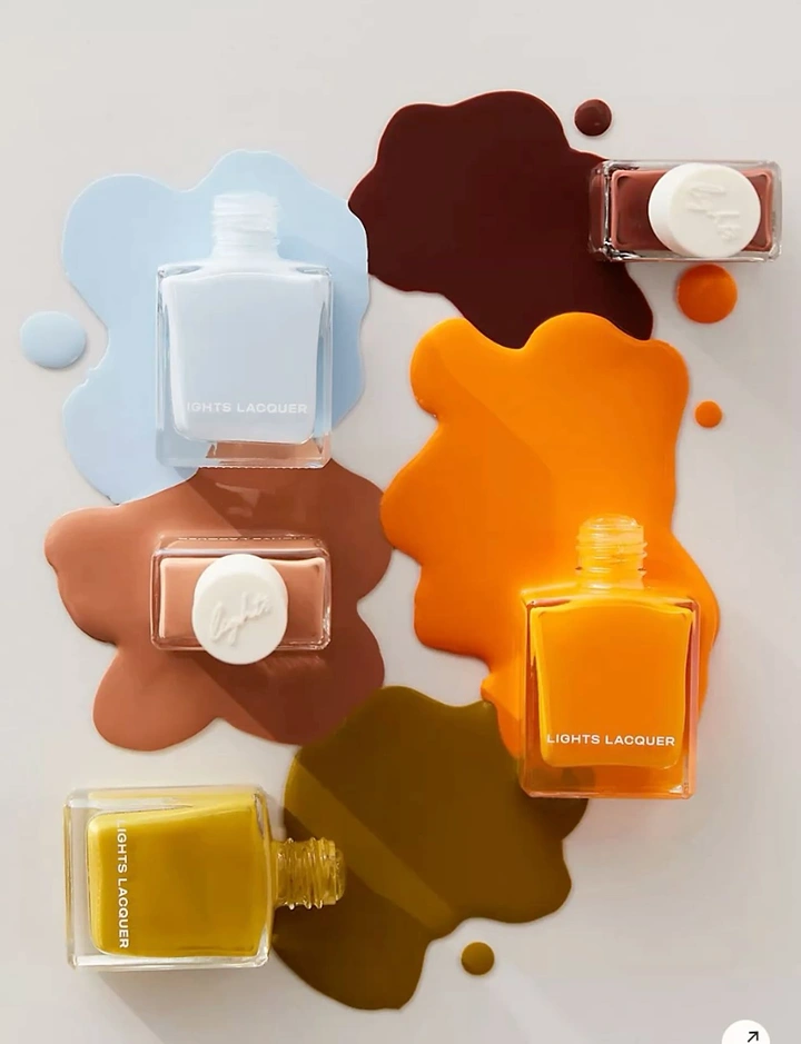 Nail Polish Brands creative ad: Polish bottles surrounded by shade swatches