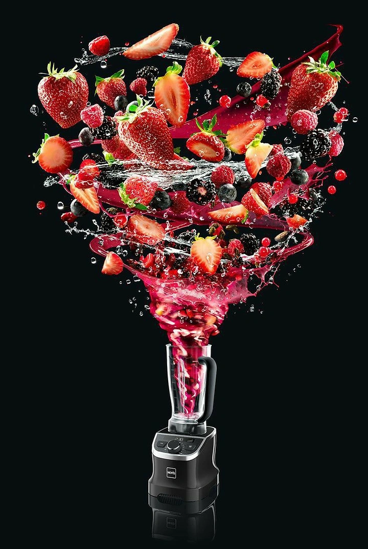 Kitchenware & Cookware creative ad: Berry and juice tornado swirling out of a blender