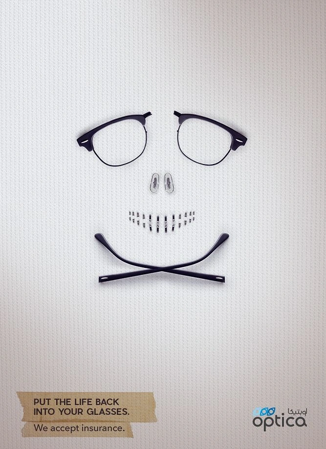 Opticians & Eye Care creative ad: Pieces of broken glasses laid out as a skull and crossbones