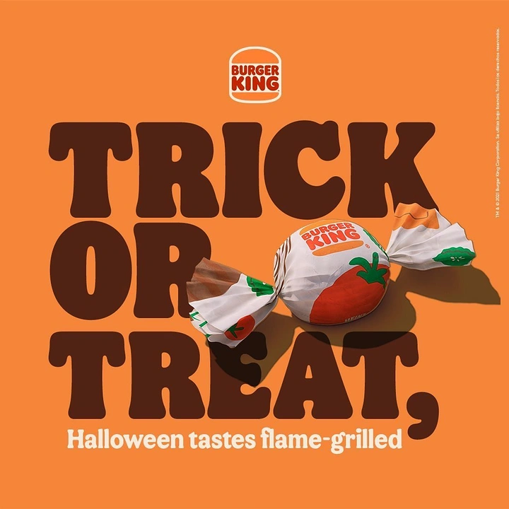 Halloween creative ad: Burger wrapped like a twist candy